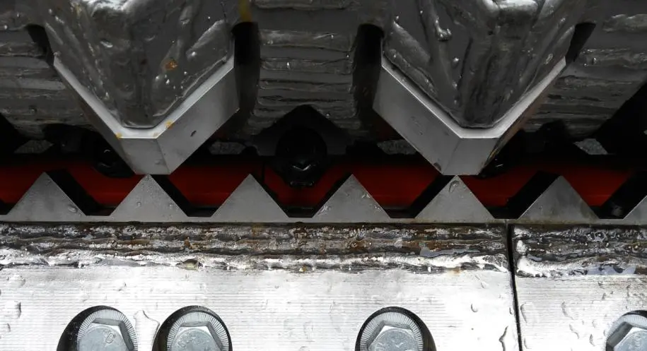 Shredder knives installed in an industrial cutting chamber